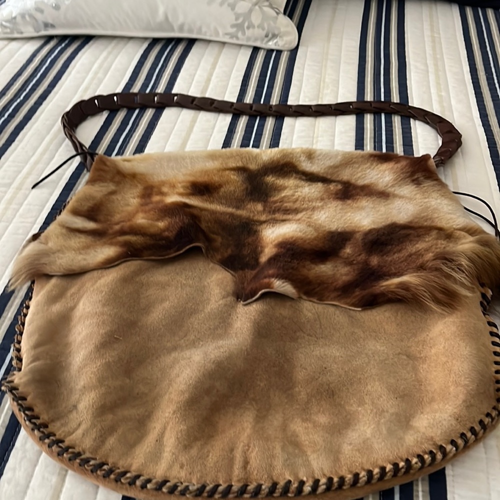 Natural calfskin hobo style shoulder bag minimal wear approximately 16”w X 18”l